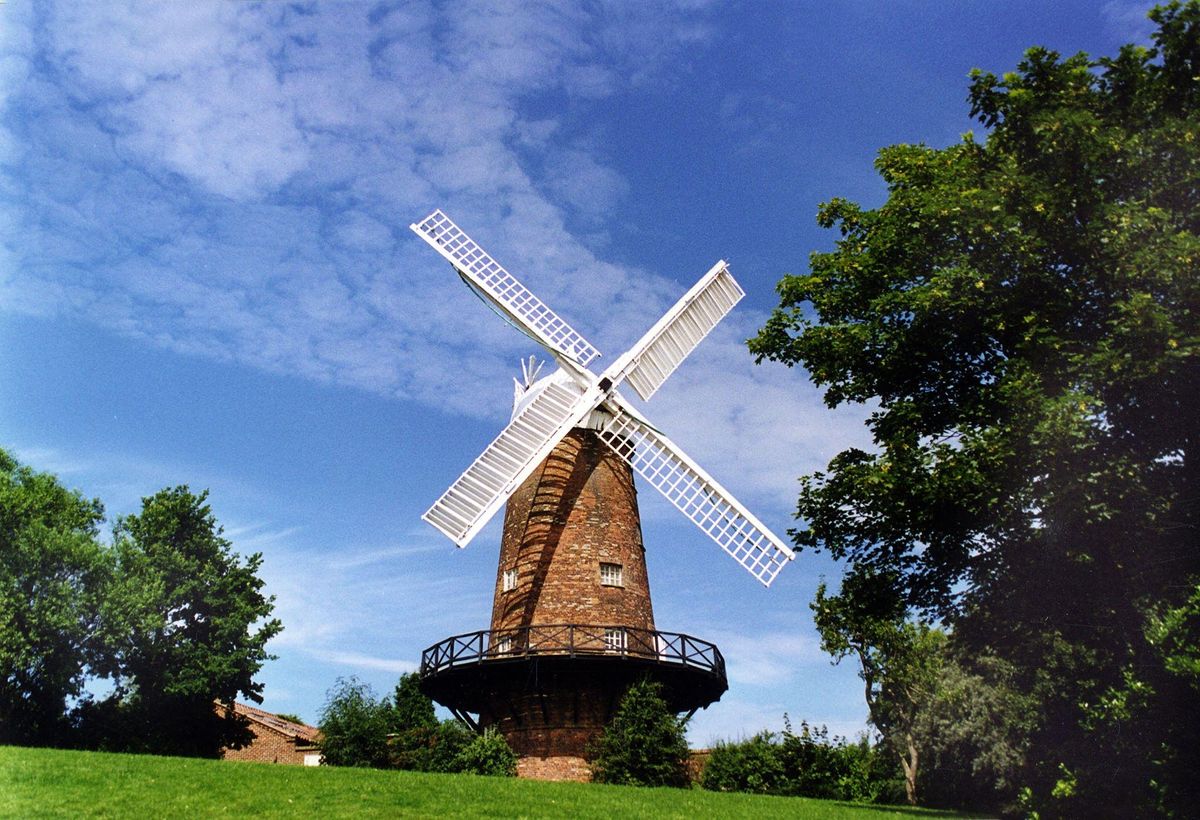 greens-windmill-sneinton-on-grassy-hill-on-sunny-day-places-to-visit-in-nottingham